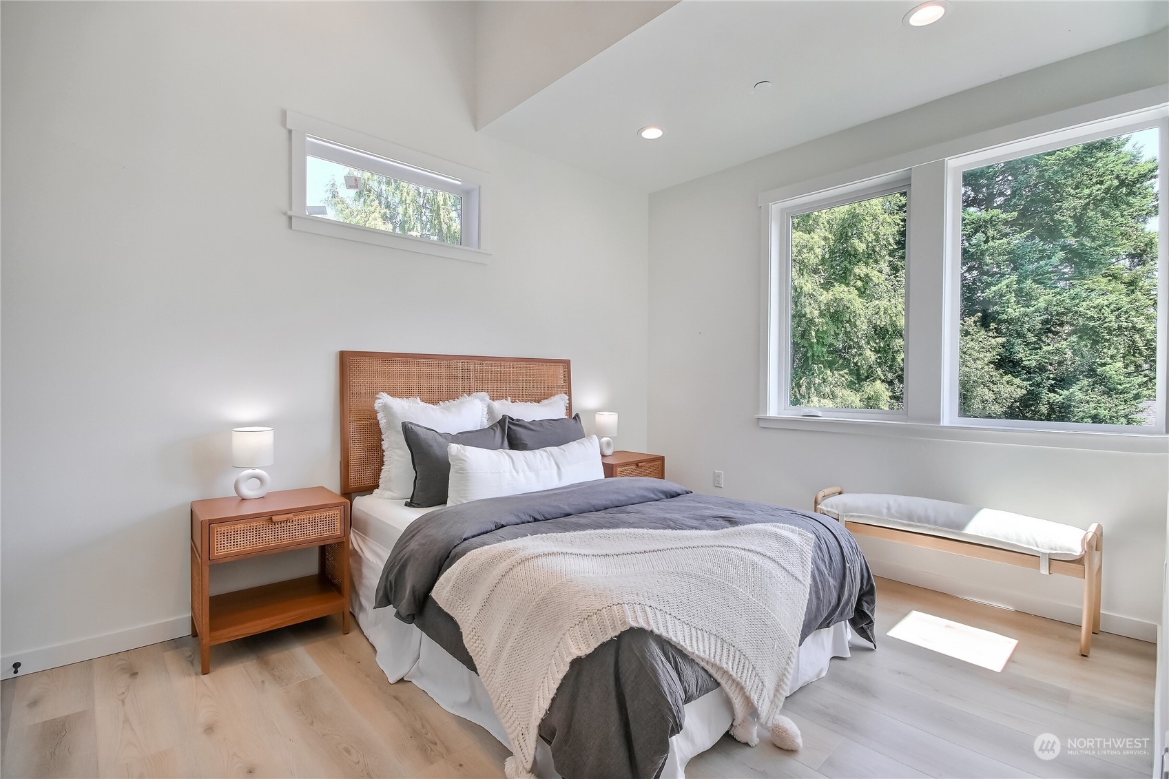 6839 35th Avenue Northeast, Unit A Seattle, WA 98115 - Photo 25 of 39 a bedroom with a bed and a window