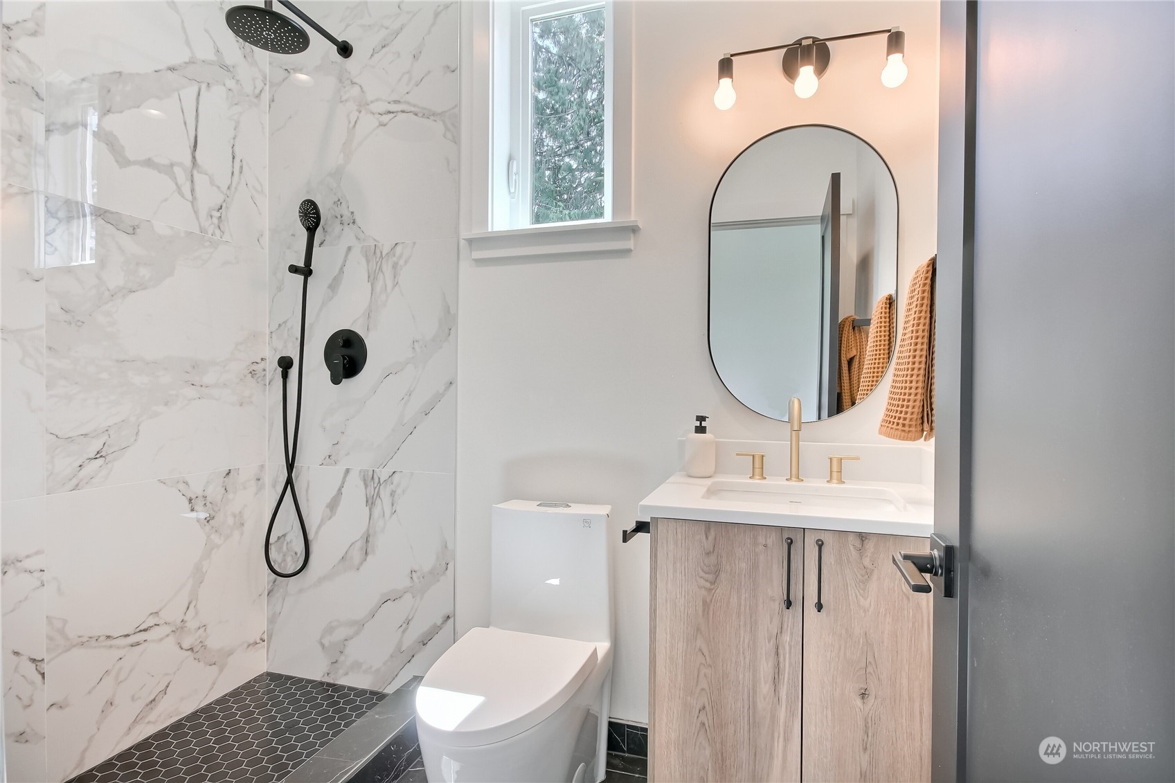 6839 35th Avenue Northeast, Unit A Seattle, WA 98115 - Photo 28 of 39 a bathroom with a granite countertop sink toilet and shower