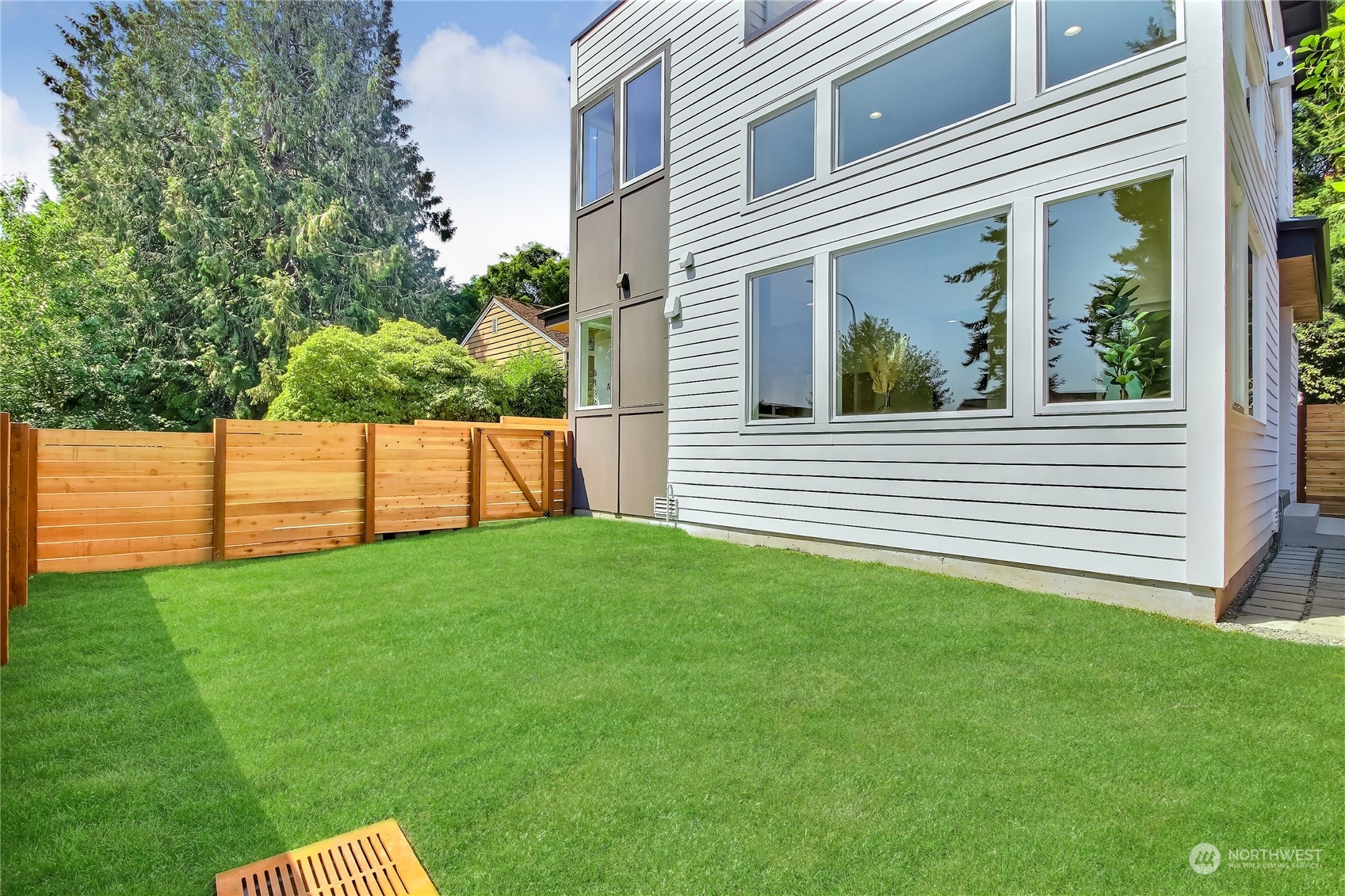 6839 35th Avenue Northeast, Unit A Seattle, WA 98115 - Photo 32 of 39 a view of a back yard of the house