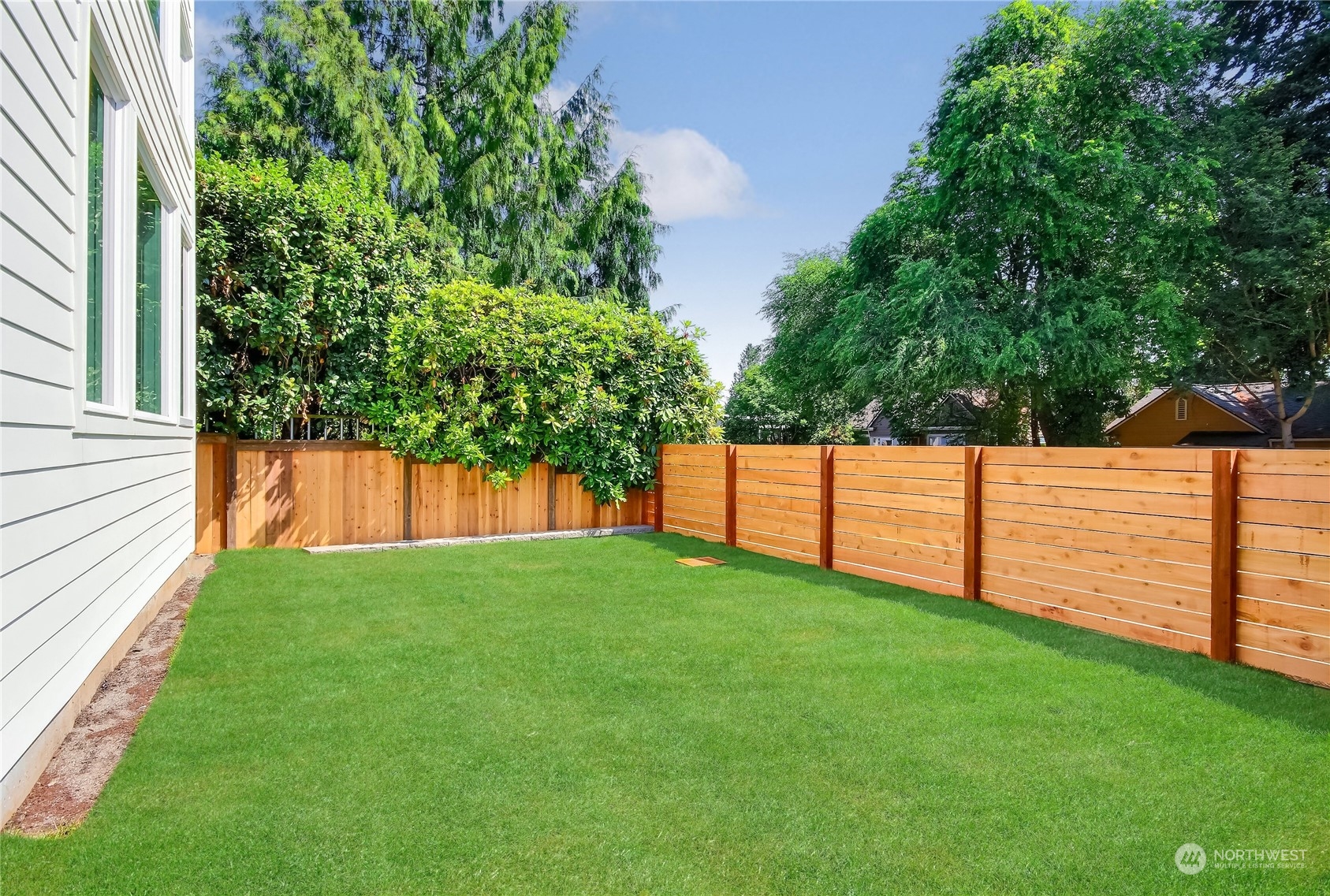 6839 35th Avenue Northeast, Unit A Seattle, WA 98115 - Photo 33 of 39 a view of yard with green space