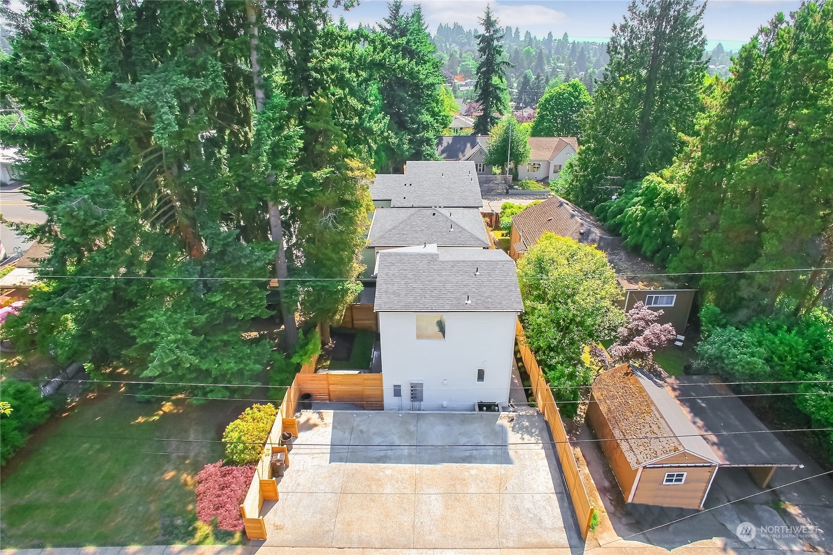 6839 35th Avenue Northeast, Unit A Seattle, WA 98115 - Photo 34 of 39 an aerial view of a house with a swimming pool