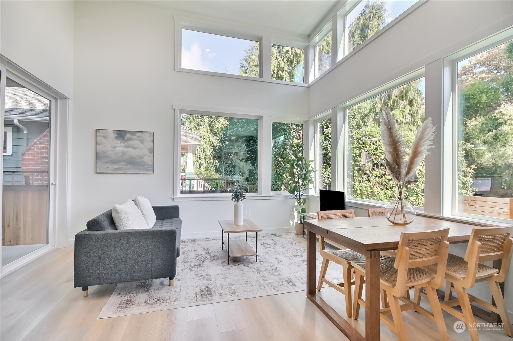 6839 35th Avenue Northeast, Unit A Seattle, WA 98115 - Photo 9 of 39 a living room with furniture and a large window