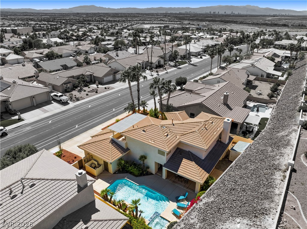 1135 Calico Ridge Drive Henderson, NV 89011 - Photo 64 of 86 An aerial perspective reveals this residence's private pool and convenient access to neighborhood streets.
