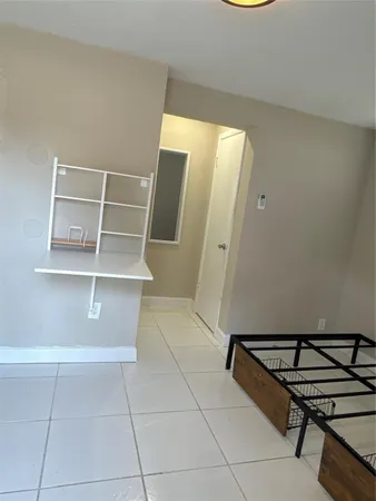 a view of a room with rack on the wall