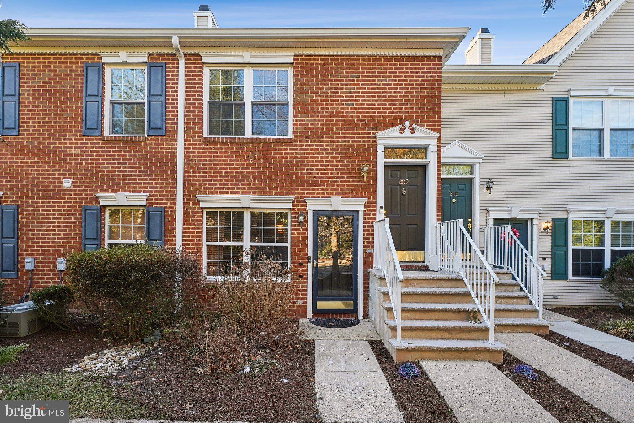 209 Castleton Court Pennington, NJ 08534 - Photo 1 of 1 a front view of a house with a yard
