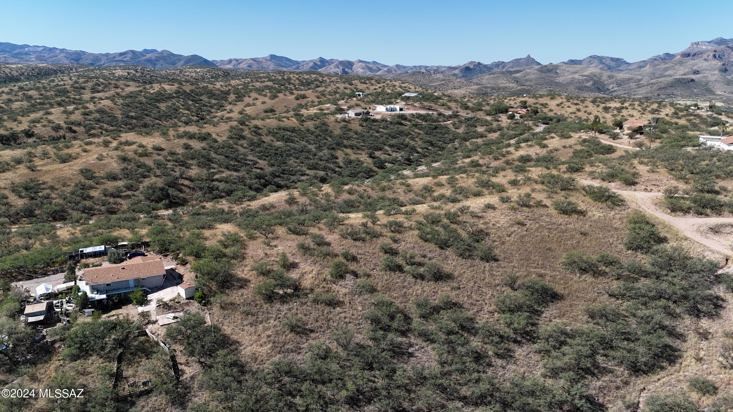 600 Paseo Reforma, Unit 71 Rio Rico, AZ 85648 - Photo 7 of 13 an aerial view of house with yard and mountain view in back