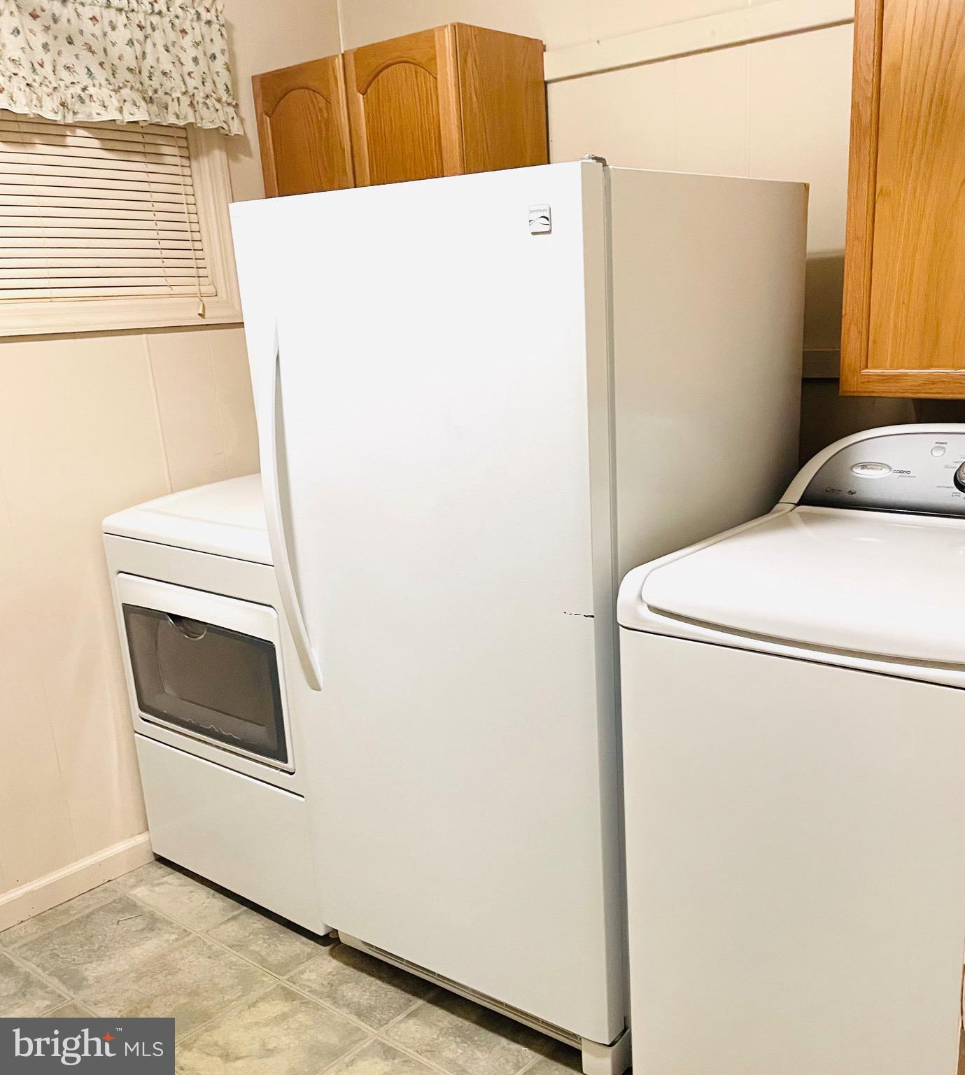 7490 Race Road Hanover, MD 21076 - Photo 9 of 19 a utility room with dryer and washer