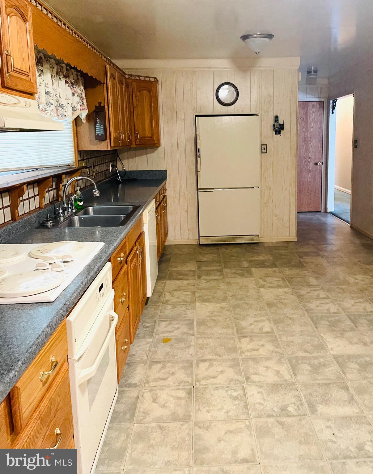 7490 Race Road Hanover, MD 21076 - Photo 10 of 23 a view of a kitchen with a sink