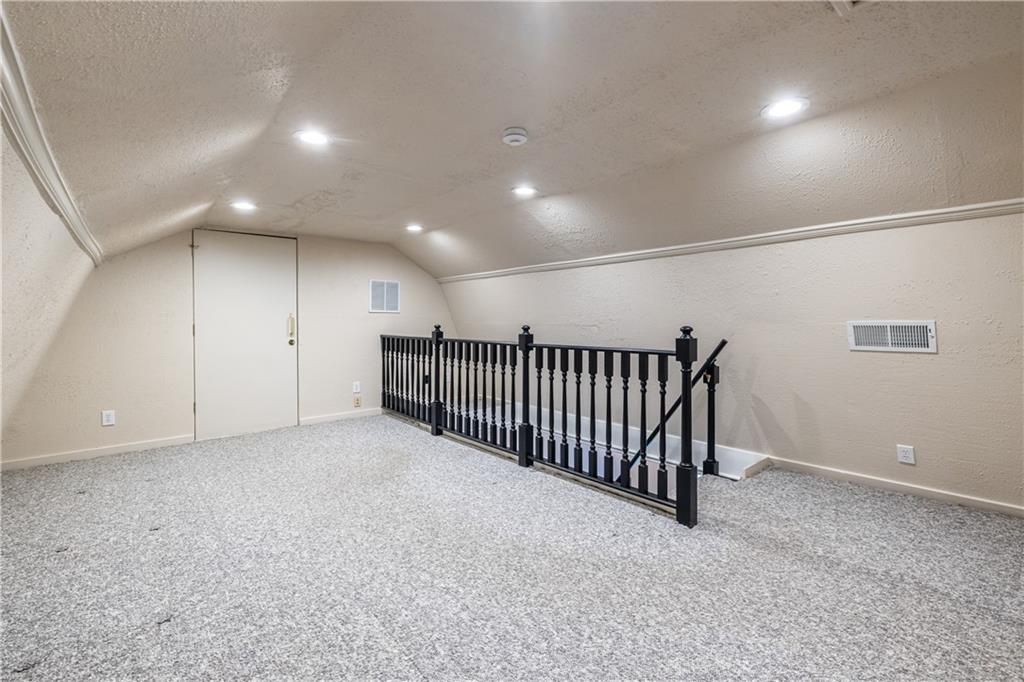 6700 Roswell Road, Unit 1C Sandy Springs, GA 30328 - Photo 29 of 41 a view of an empty room with stairs