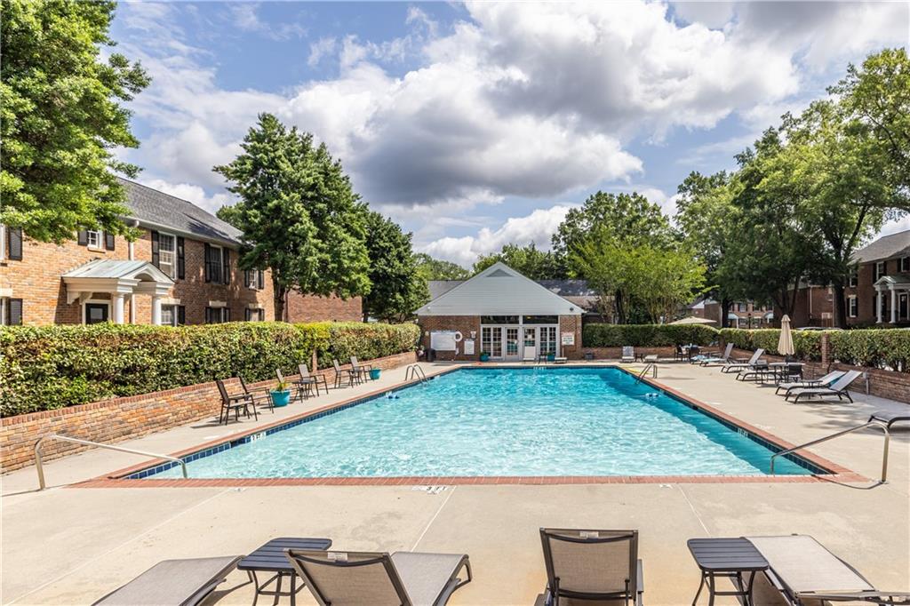 6700 Roswell Road, Unit 1C Sandy Springs, GA 30328 - Photo 38 of 41 a view of a house with a yard