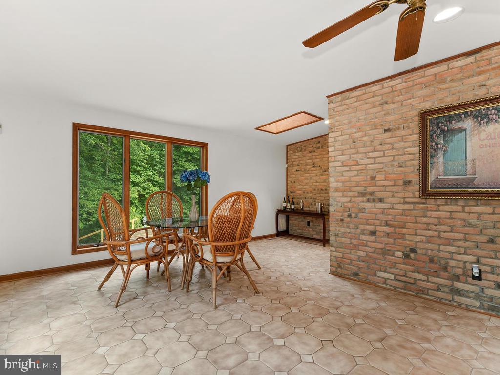 22305 Fitzgerald Drive Laytonsville, MD 20882 - Photo 28 of 109 Lounge/Sunroom 45' x '12