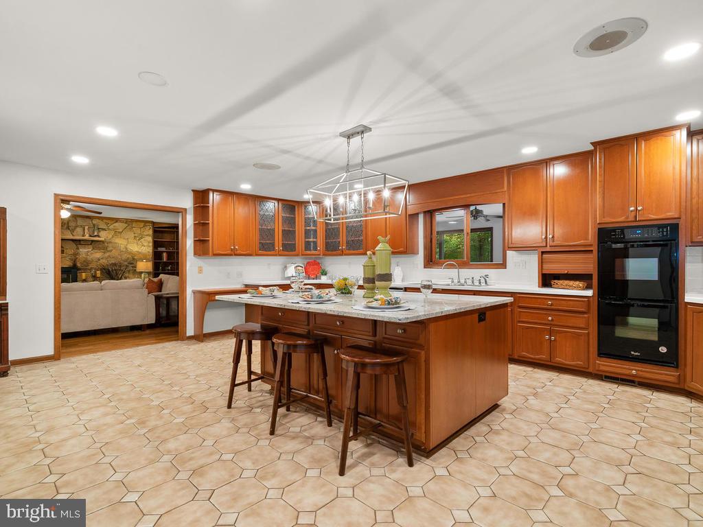 22305 Fitzgerald Drive Laytonsville, MD 20882 - Photo 30 of 109 Kitchen w/ Island Overhang Accommodating 5 Chair