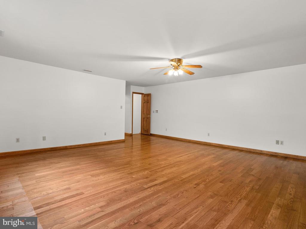 22305 Fitzgerald Drive Laytonsville, MD 20882 - Photo 51 of 109 Owner's Suite #2 w/ Staircase Leading to Kitchen
