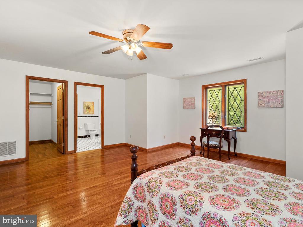 22305 Fitzgerald Drive Laytonsville, MD 20882 - Photo 62 of 109 19' x 16' Bedroom #4 w/ Walk-in Closet