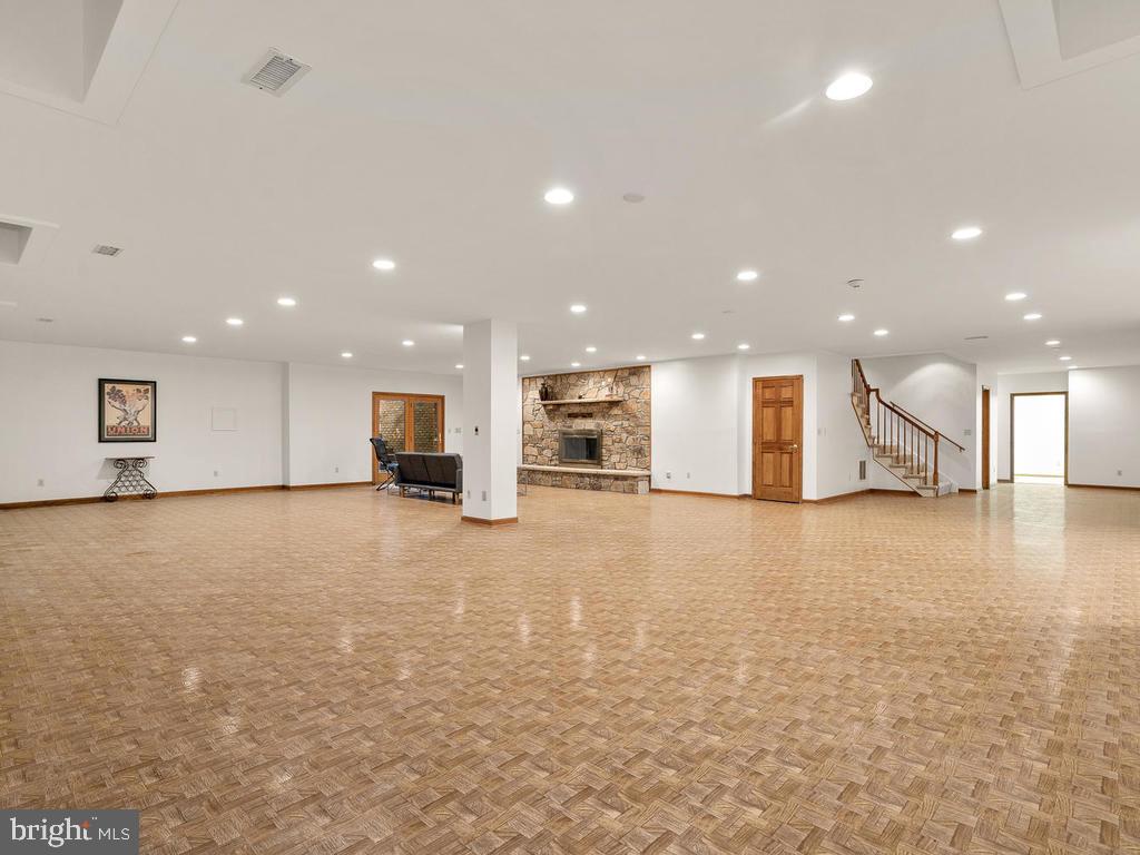 22305 Fitzgerald Drive Laytonsville, MD 20882 - Photo 78 of 109 Basement w/ Fireplace