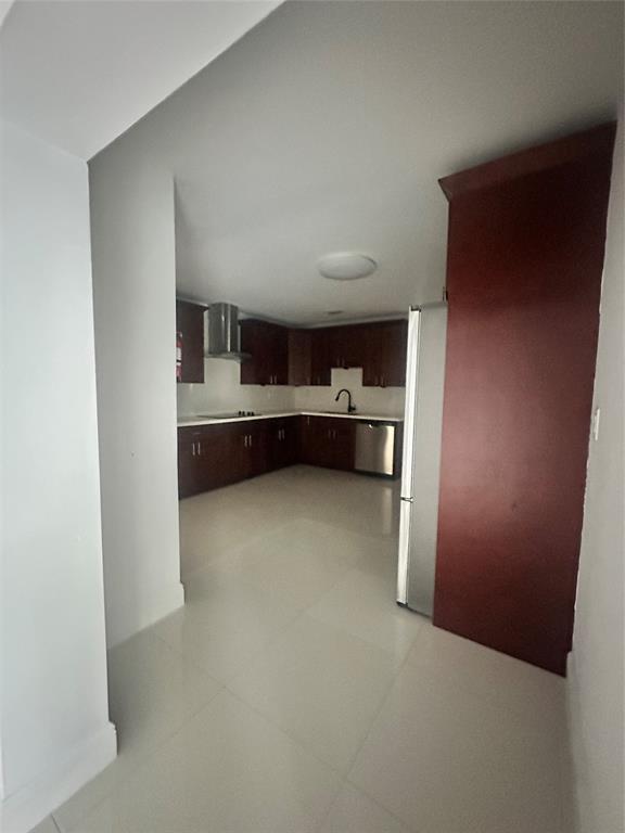2810 Northeast 60th Street Fort Lauderdale, FL 33308 - Photo 14 of 22 a room with cabinet and view