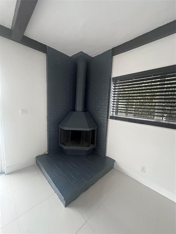 2810 Northeast 60th Street Fort Lauderdale, FL 33308 - Photo 16 of 22 a living room with a rug