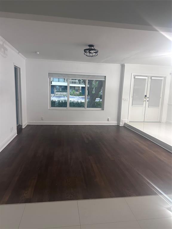 2810 Northeast 60th Street Fort Lauderdale, FL 33308 - Photo 19 of 22 a view of an empty room with a window