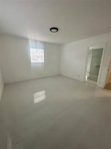 an empty room with a door