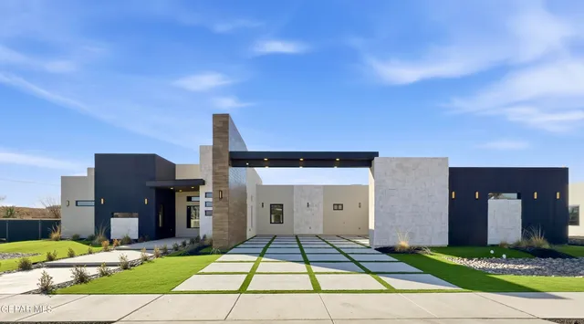 a front view of a house with yard