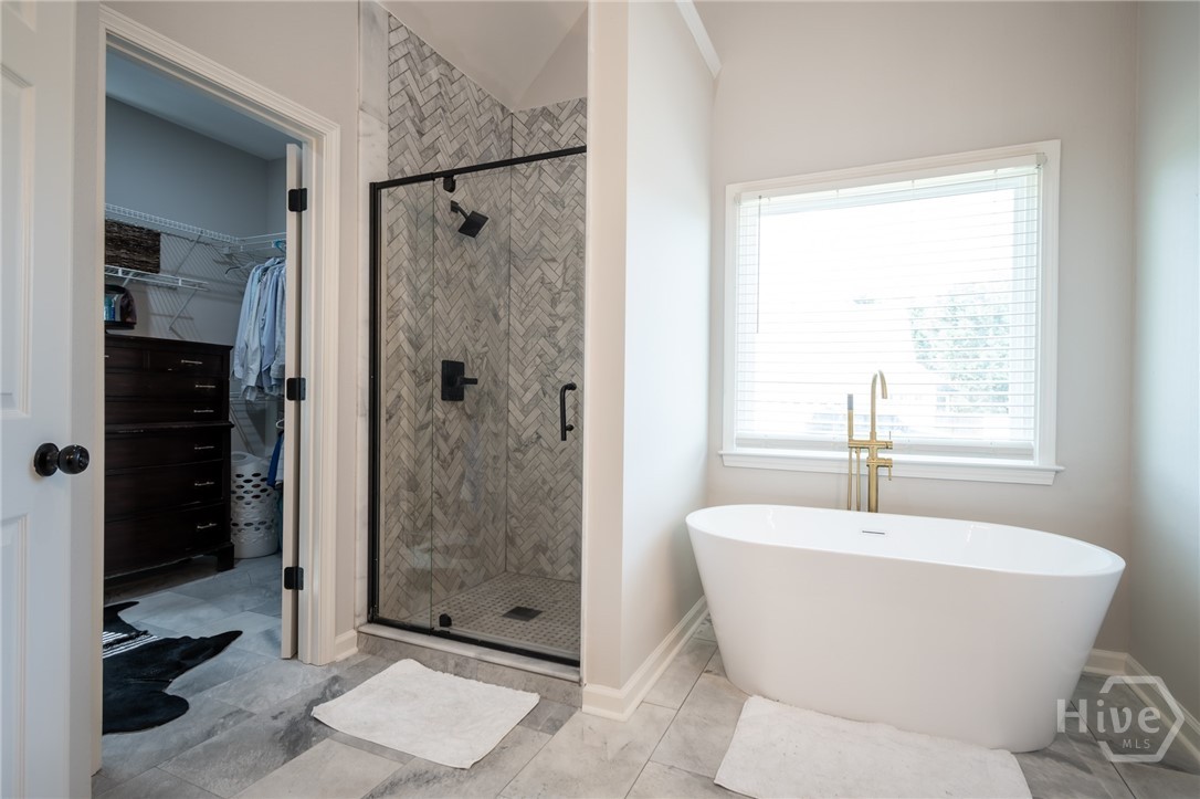 768 Appian Way Statham, GA 30666 - Photo 13 of 30 Master bath with new tile shower and tub