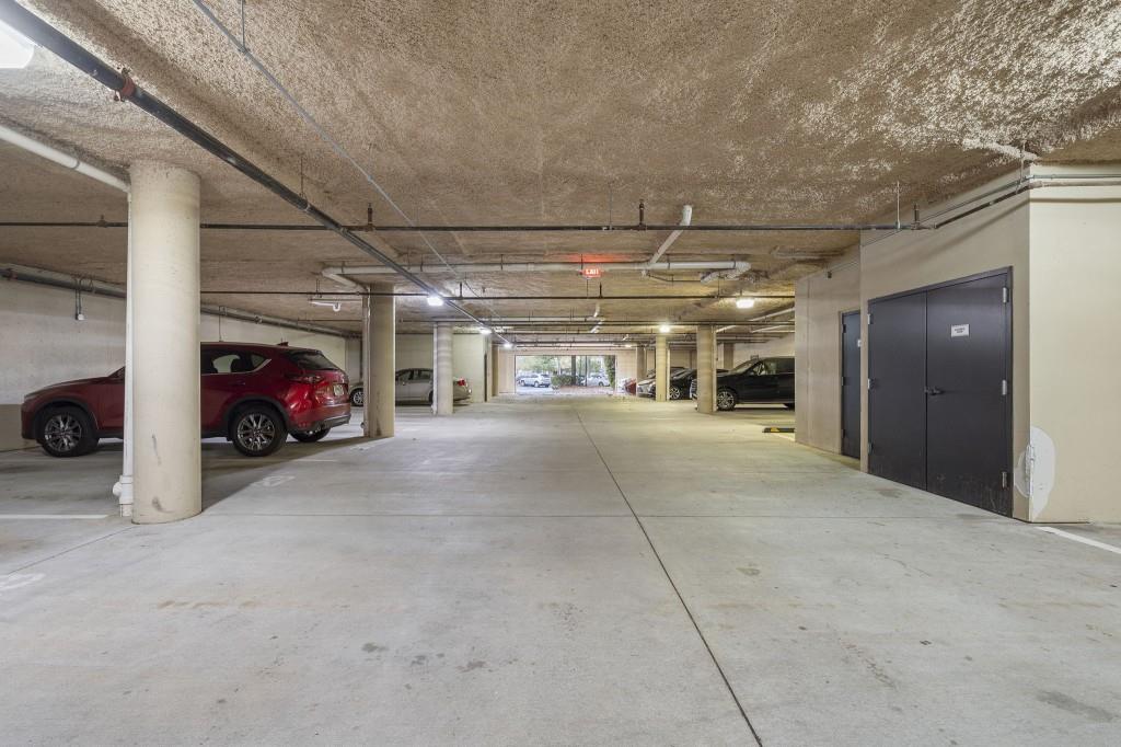 2300 Peachford Road, Unit 4403 Atlanta, GA 30338 - Photo 27 of 27 a view of parking garage with cars