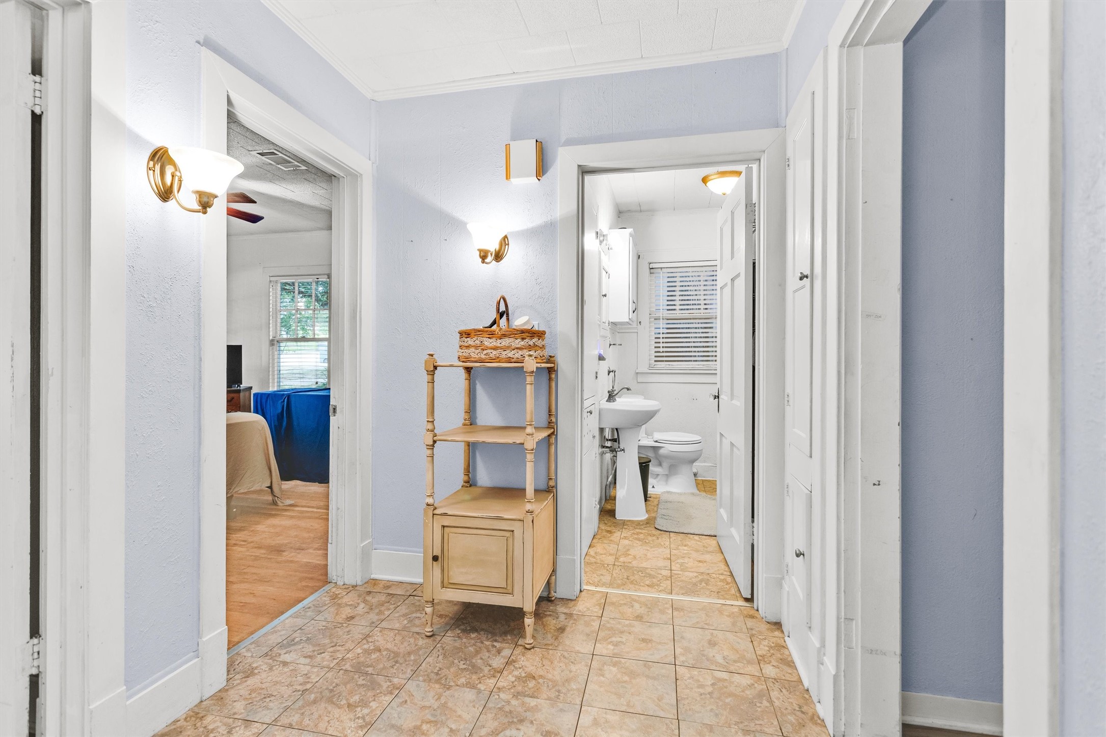 1720 18th Street Huntsville, TX 77340 - Photo 20 of 37 a bathroom with a glass door shower and a sink