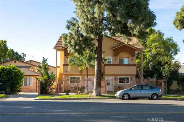an aerial view of a house with swimming pool
