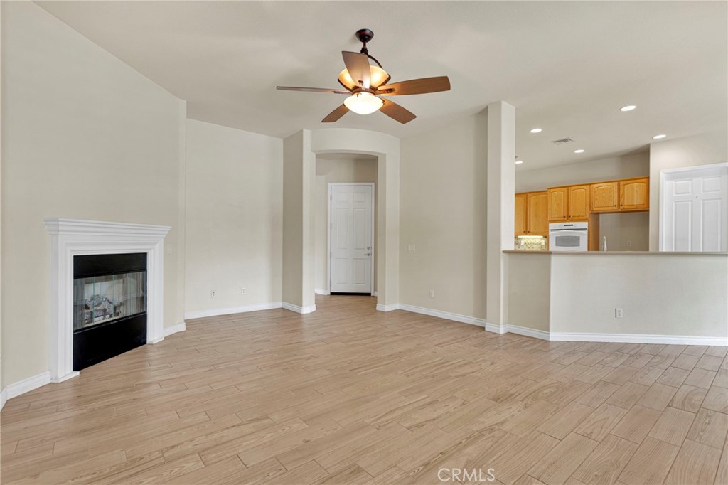 10429 Lanigan Road Apple Valley, CA 92308 - Photo 12 of 41 a view of an empty room with a kitchen