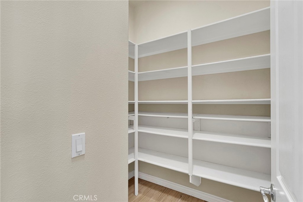 10429 Lanigan Road Apple Valley, CA 92308 - Photo 21 of 41 a view of walk in closet with empty racks
