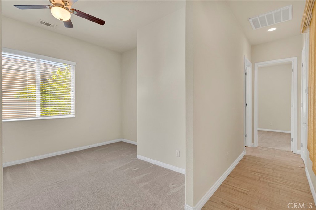 10429 Lanigan Road Apple Valley, CA 92308 - Photo 28 of 41 a view of an empty room with a window