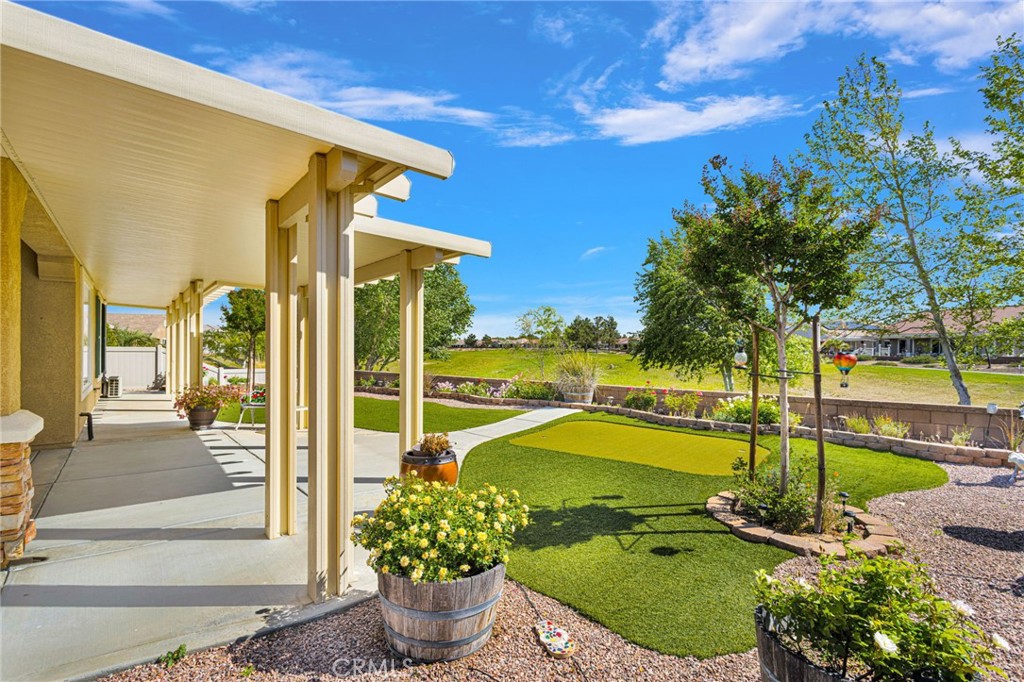 10429 Lanigan Road Apple Valley, CA 92308 - Photo 9 of 41 a view of a swimming pool with a patio