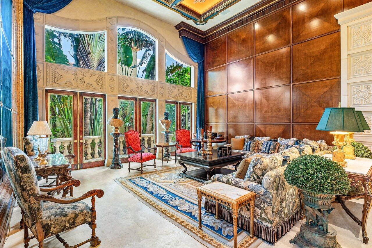 428 Addison Park Lane Boca Raton, FL 33432 - Photo 11 of 48 a view of an outdoor sitting area with furniture and umbrella