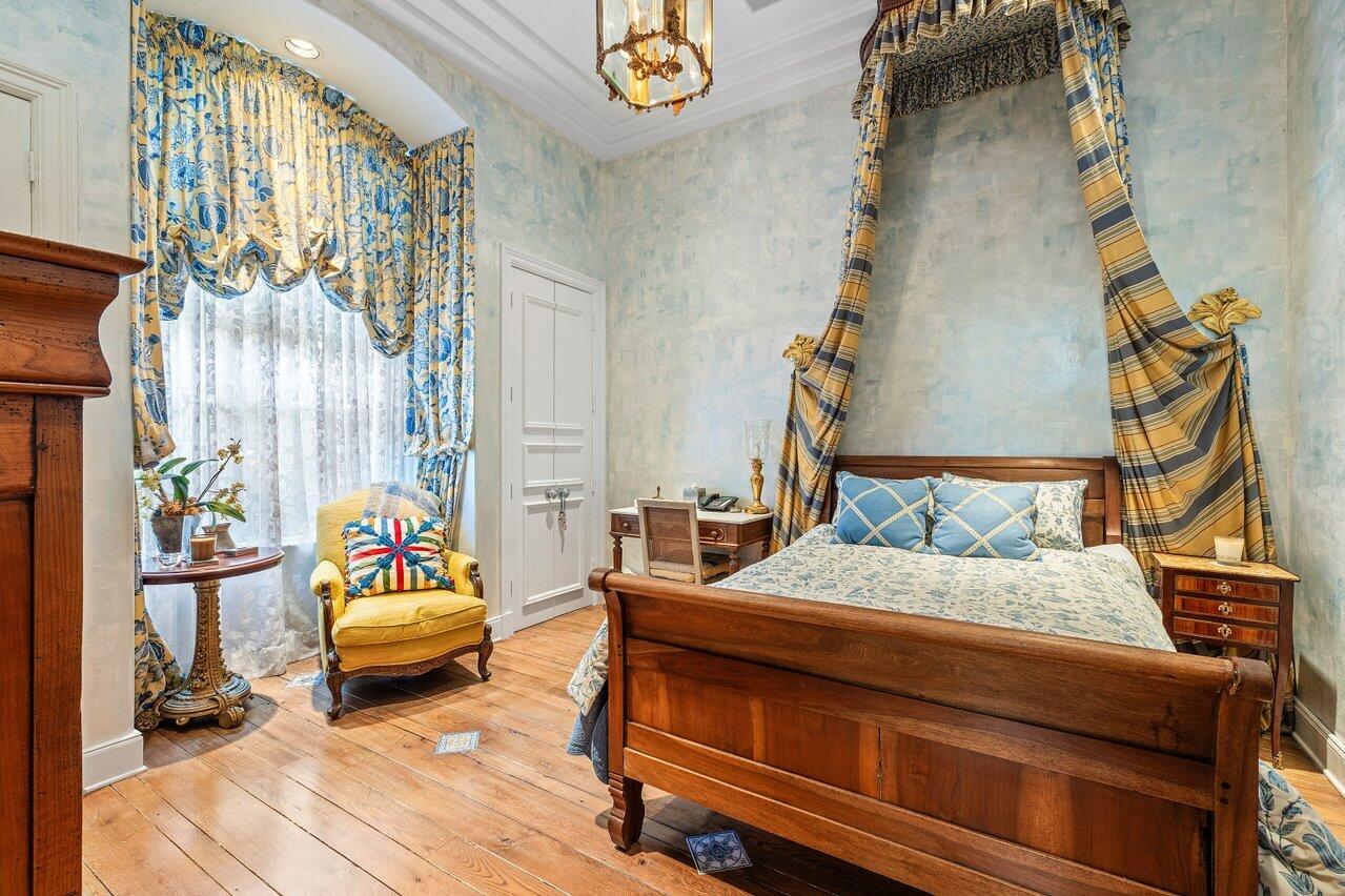 428 Addison Park Lane Boca Raton, FL 33432 - Photo 28 of 48 a bedroom with a bed and a couch