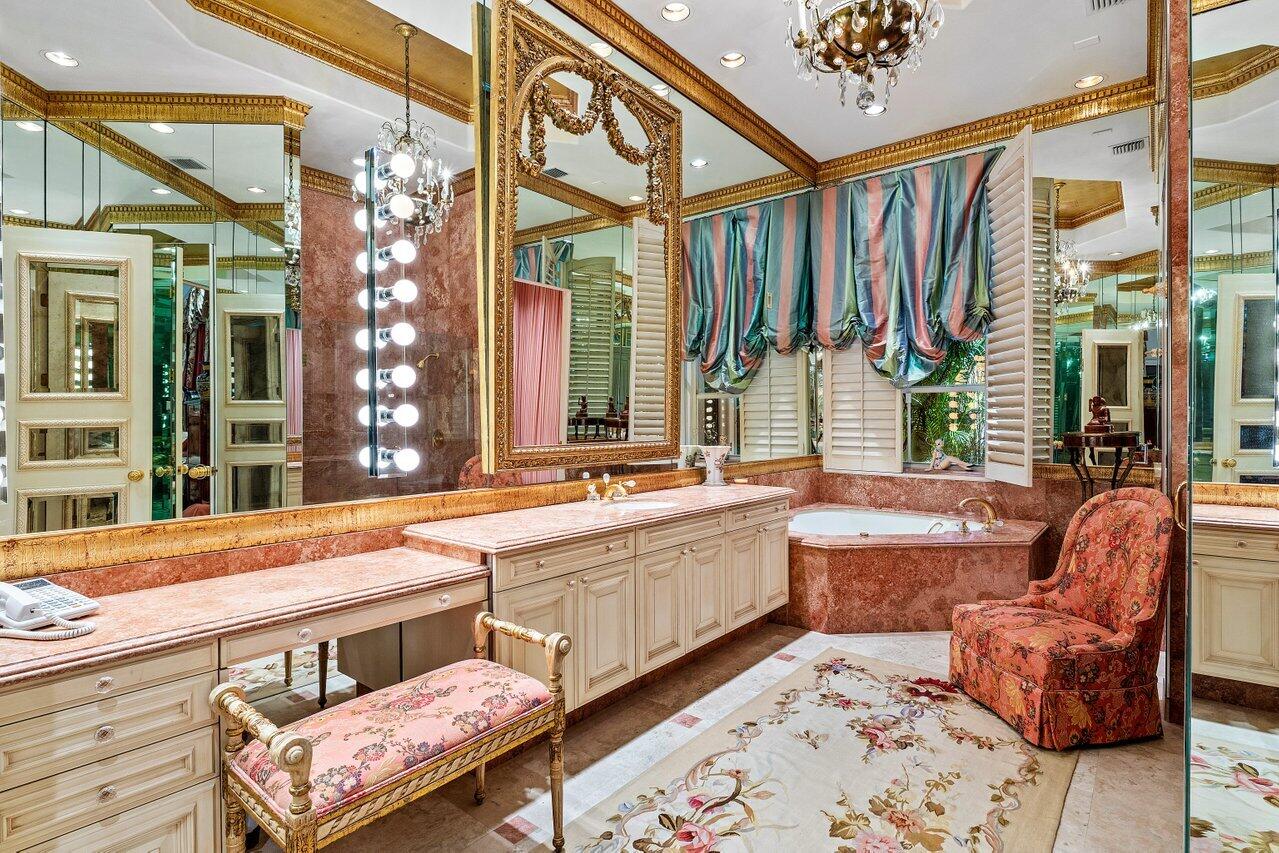 428 Addison Park Lane Boca Raton, FL 33432 - Photo 34 of 48 a living room with furniture and a large window