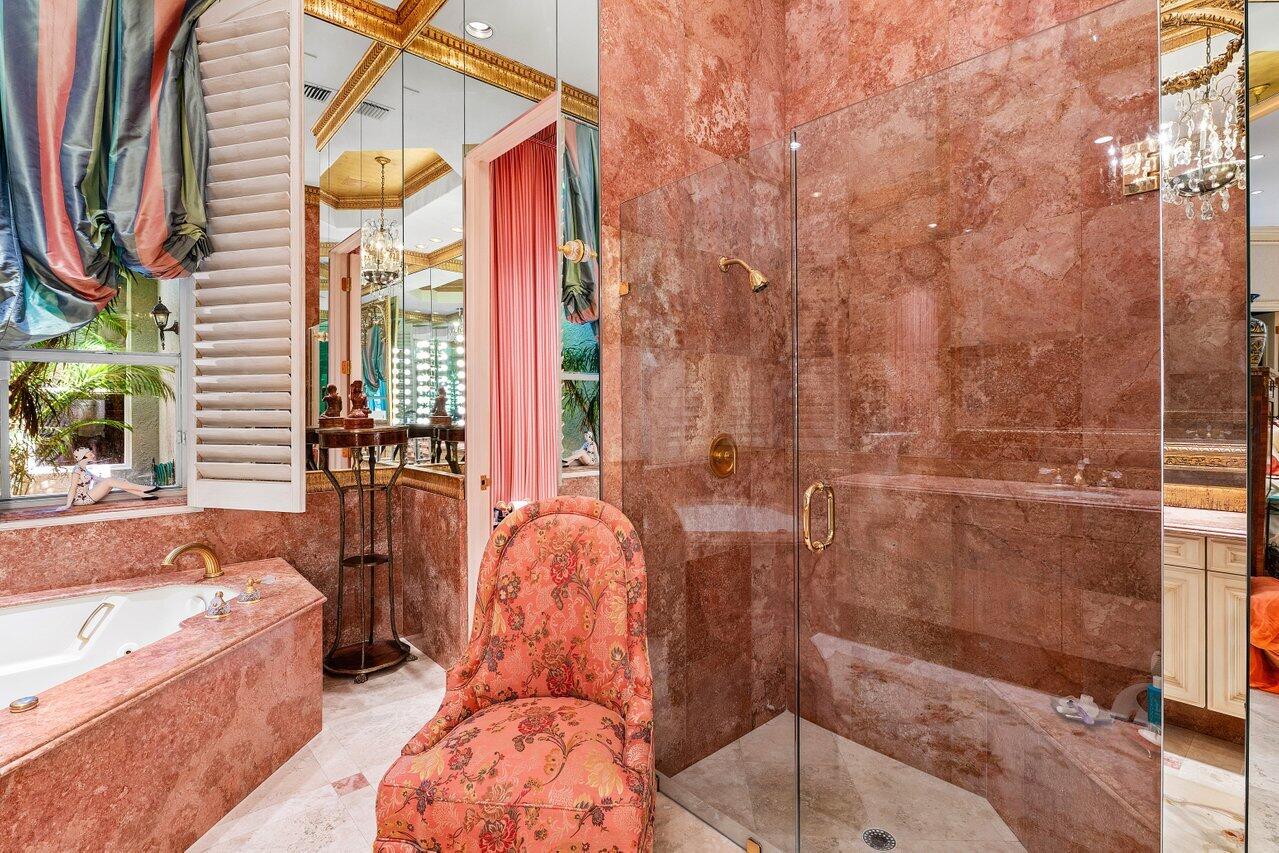 428 Addison Park Lane Boca Raton, FL 33432 - Photo 35 of 48 a bathroom with a bathtub and shower