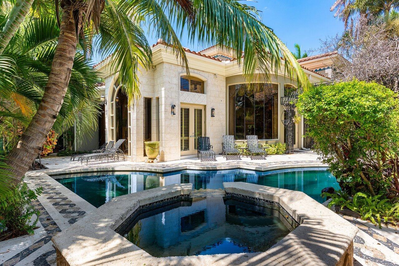 428 Addison Park Lane Boca Raton, FL 33432 - Photo 41 of 48 a view of a house with swimming pool and sitting area