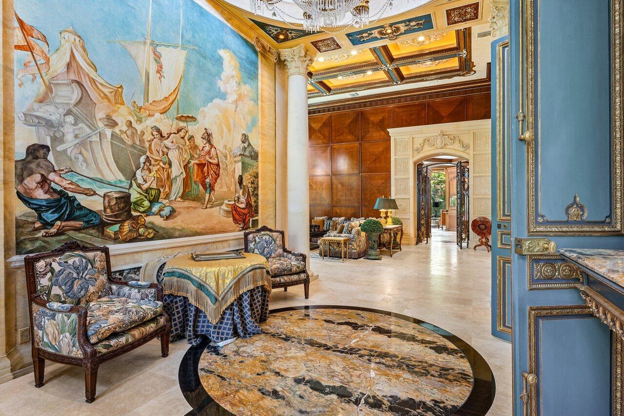 428 Addison Park Lane Boca Raton, FL 33432 - Photo 7 of 48 a living room with furniture and a chandelier