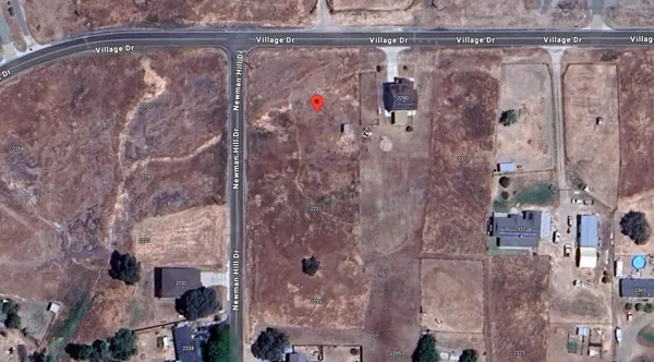 a view of a lake with a big yard