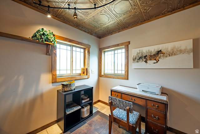 2029 West Tollgate Road Coalville, UT 84017 - Photo 23 of 36 Decorative metal tile ceiling with track lighting