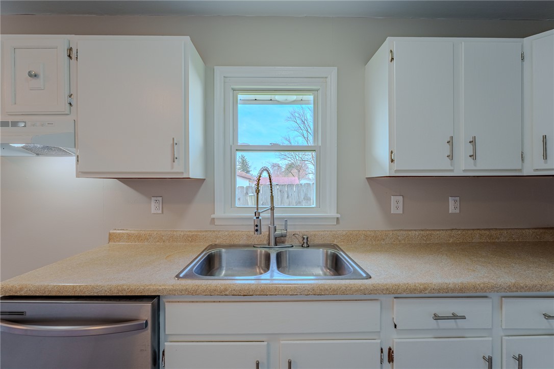 1005 Burt Street Springfield, OH 45505 - Photo 15 of 33 This kitchen features a bright window and a practical layout.