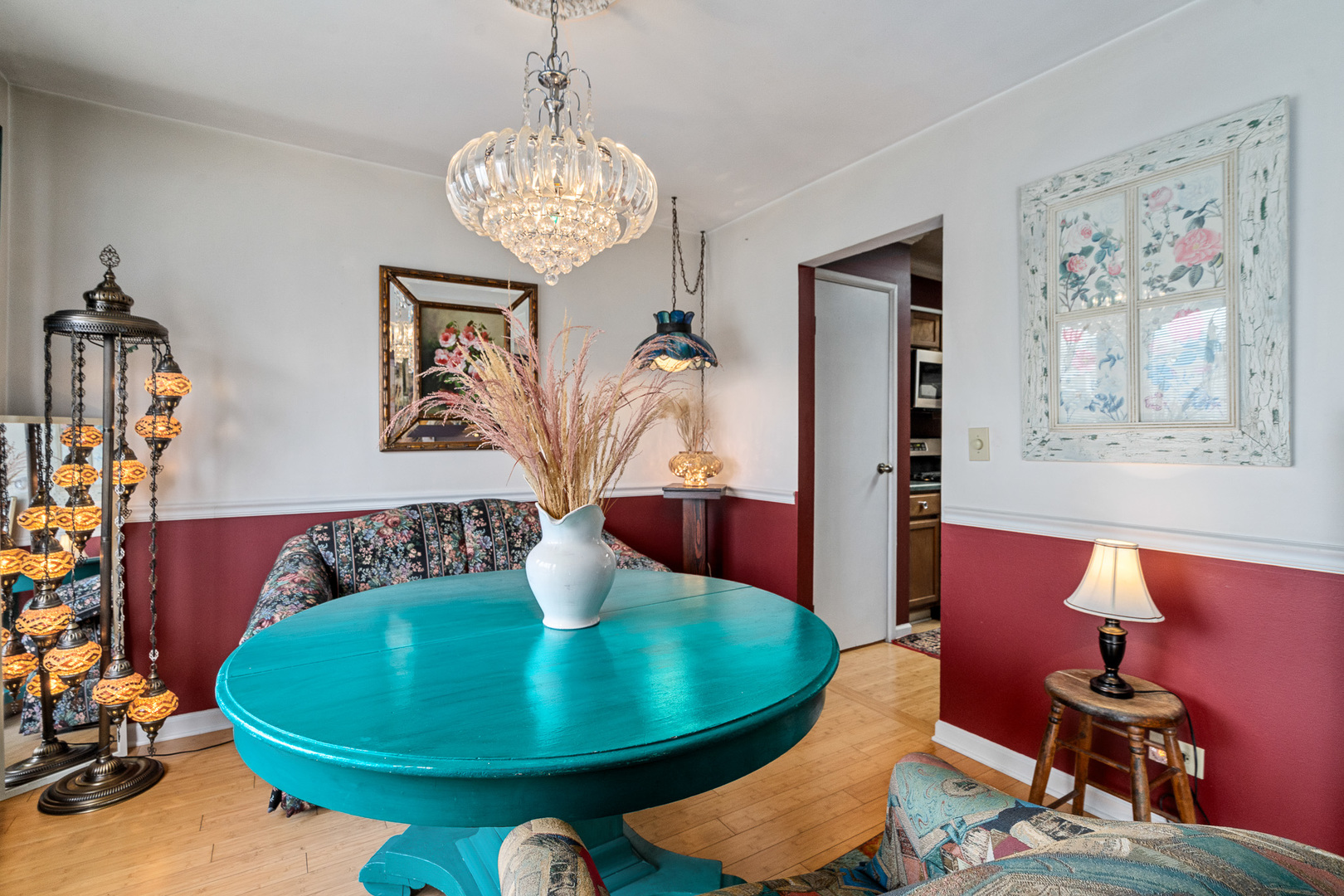 130 Jerome Lane Bolingbrook, IL 60440 - Photo 11 of 32 a view of a dining room with furniture wooden floor and a chandelier