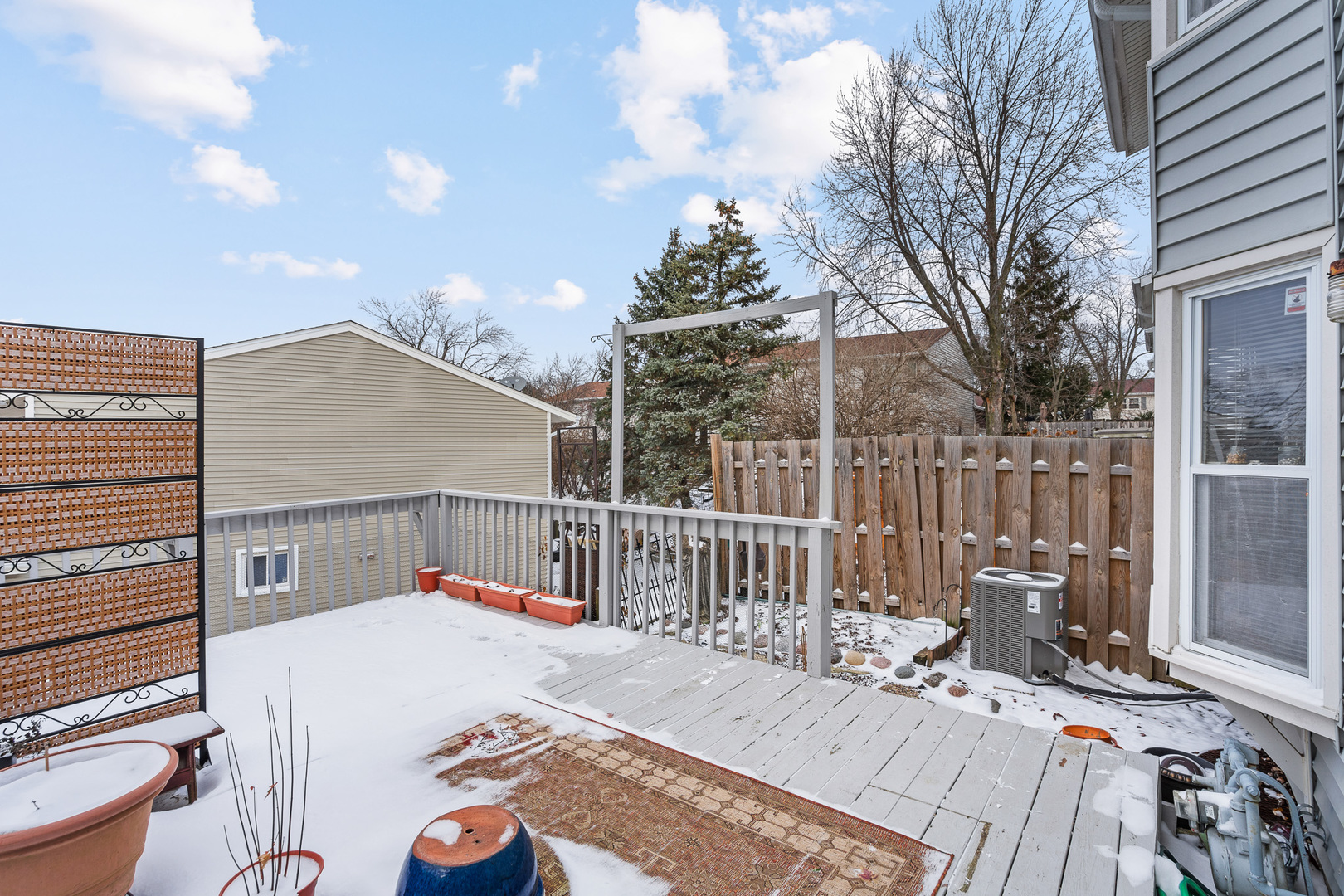 130 Jerome Lane Bolingbrook, IL 60440 - Photo 28 of 32 a terrace with a table and chairs and wooden floor
