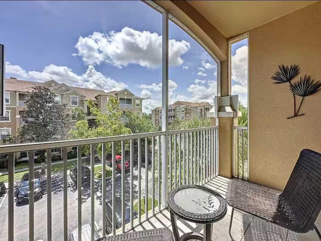 2784 Almaton Loop, Unit 301 Kissimmee, FL 34747 - Photo 21 of 37 a view of a balcony with furniture