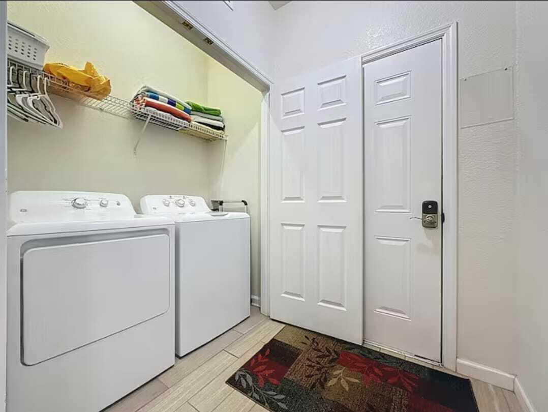 2784 Almaton Loop, Unit 301 Kissimmee, FL 34747 - Photo 26 of 37 a utility room with dryer and washer