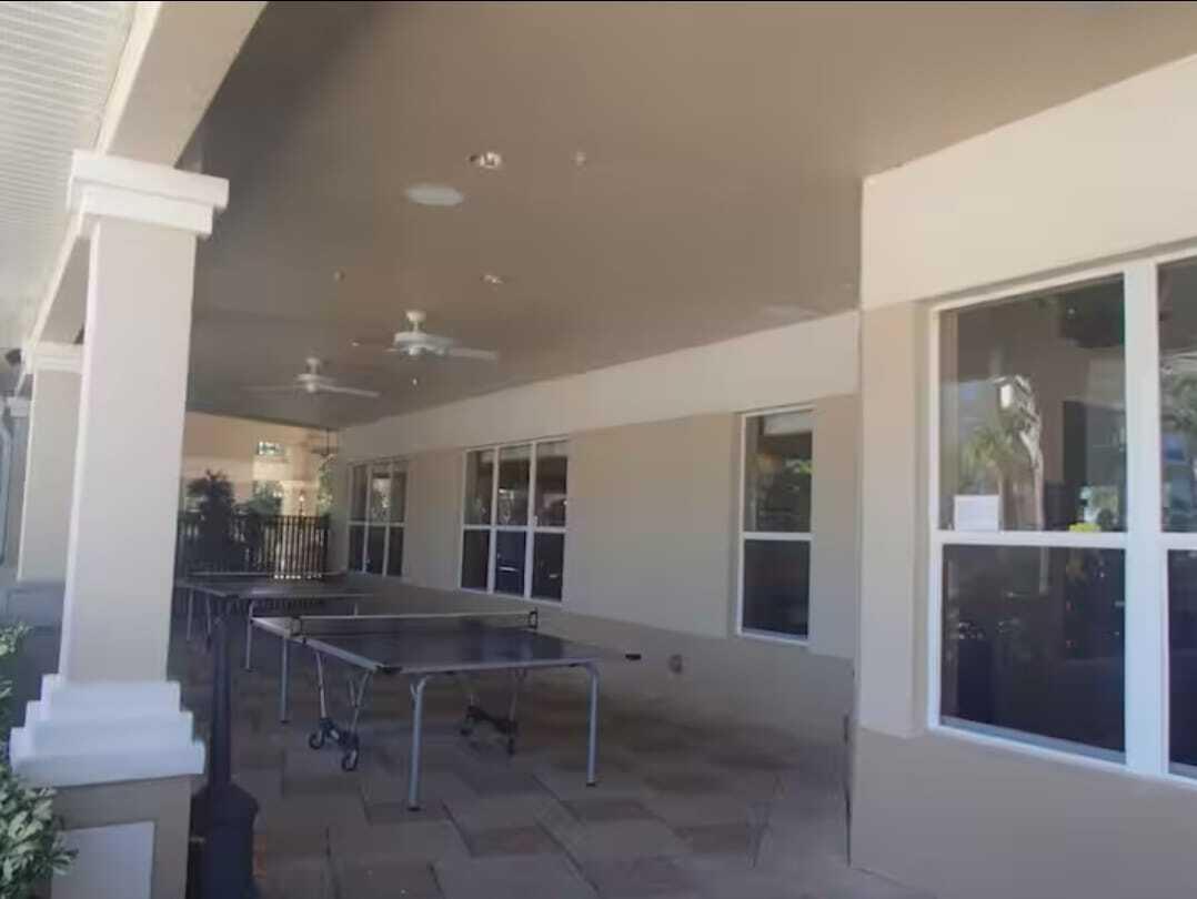 2784 Almaton Loop, Unit 301 Kissimmee, FL 34747 - Photo 37 of 37 a room with chairs and view of kitchen