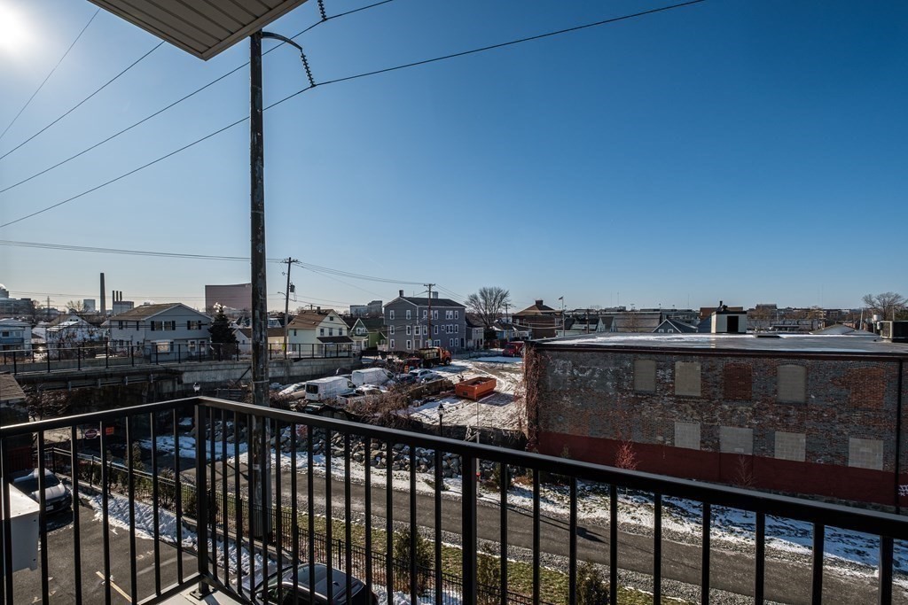 16 Laurel Street, Unit 201 Everett, MA 02149 - Photo 11 of 27 a view of city from a balcony
