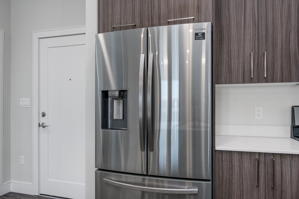 16 Laurel Street, Unit 201 Everett, MA 02149 - Photo 6 of 27 a view of kitchen with refrigerator and cabinet