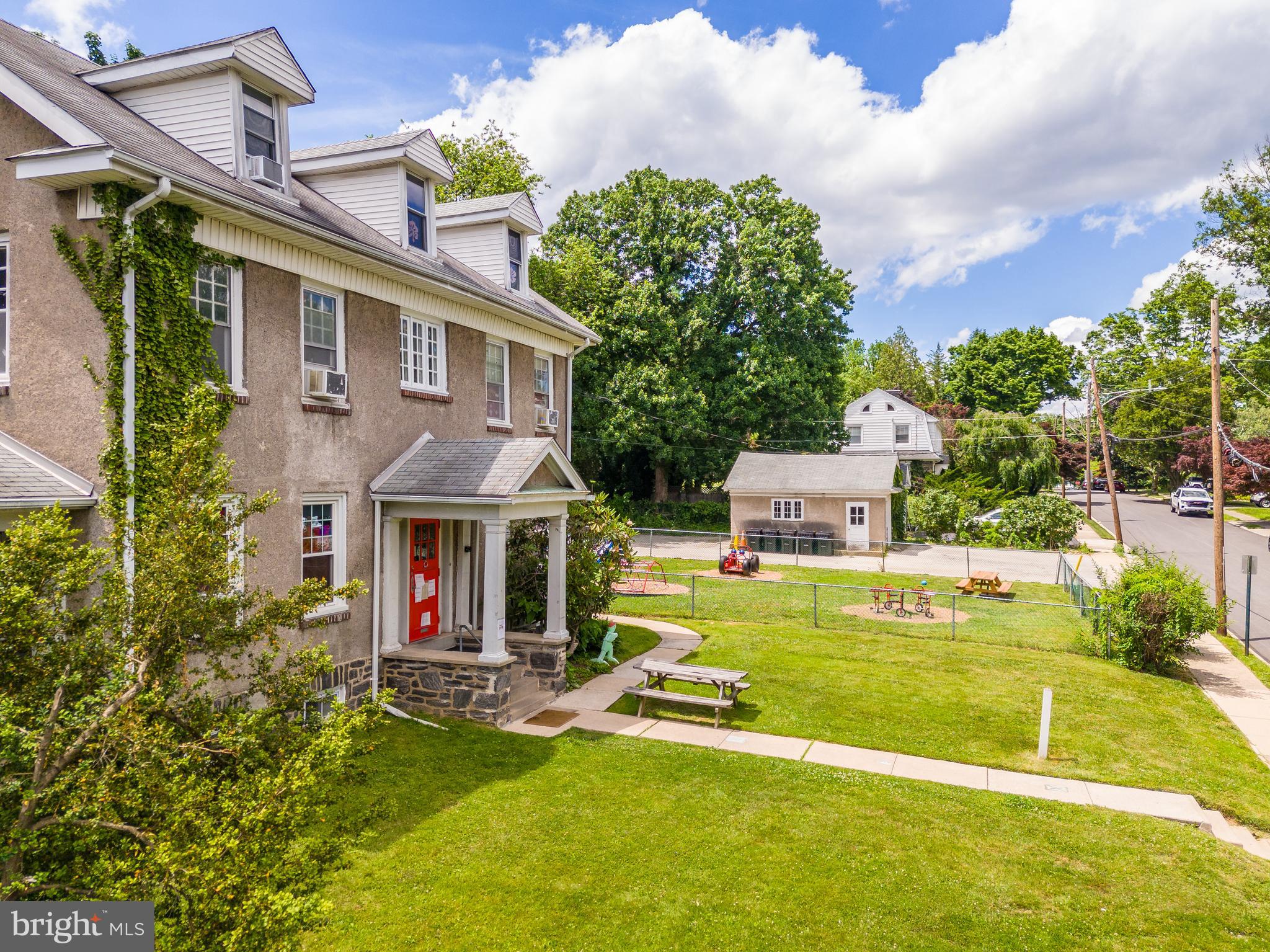 223 East Park Road Havertown, PA 19083 - Photo 11 of 37 a view of house with a big yard and potted plants