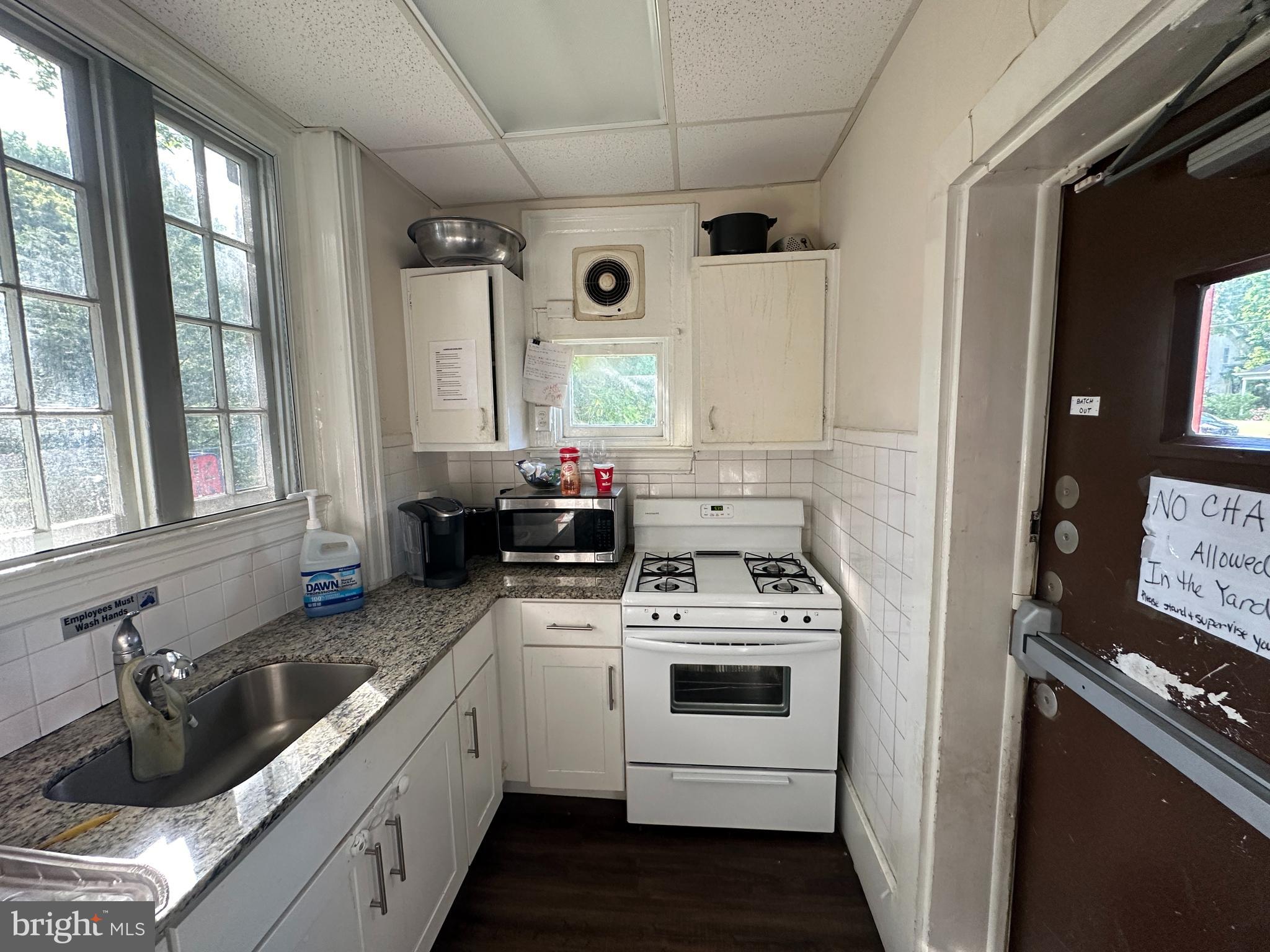 223 East Park Road Havertown, PA 19083 - Photo 23 of 37 a kitchen that has a sink and a stove